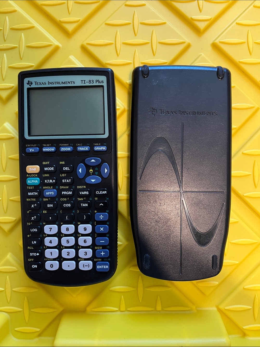 Texas Instruments TI-83 Plus Graphing Calculator - Black with Yellow Background